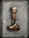 Little Doll “Torturina” death by a thousand cuts